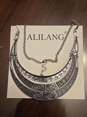 Silver-Tone Statement Bib Necklace - Tribal Engraved Design